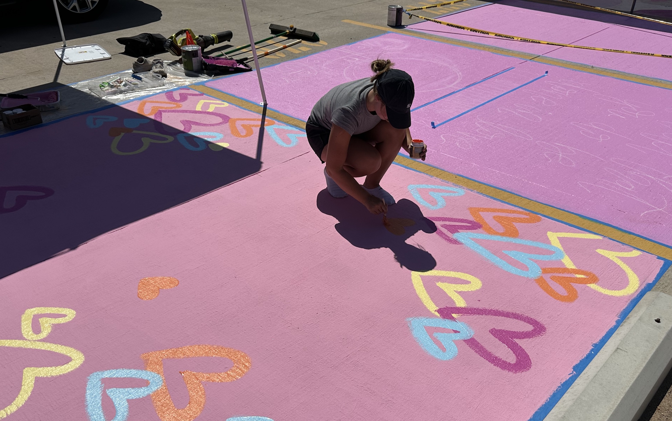 Lubbock-Cooper Seniors paint their parking spots before the 2024-25 school year.