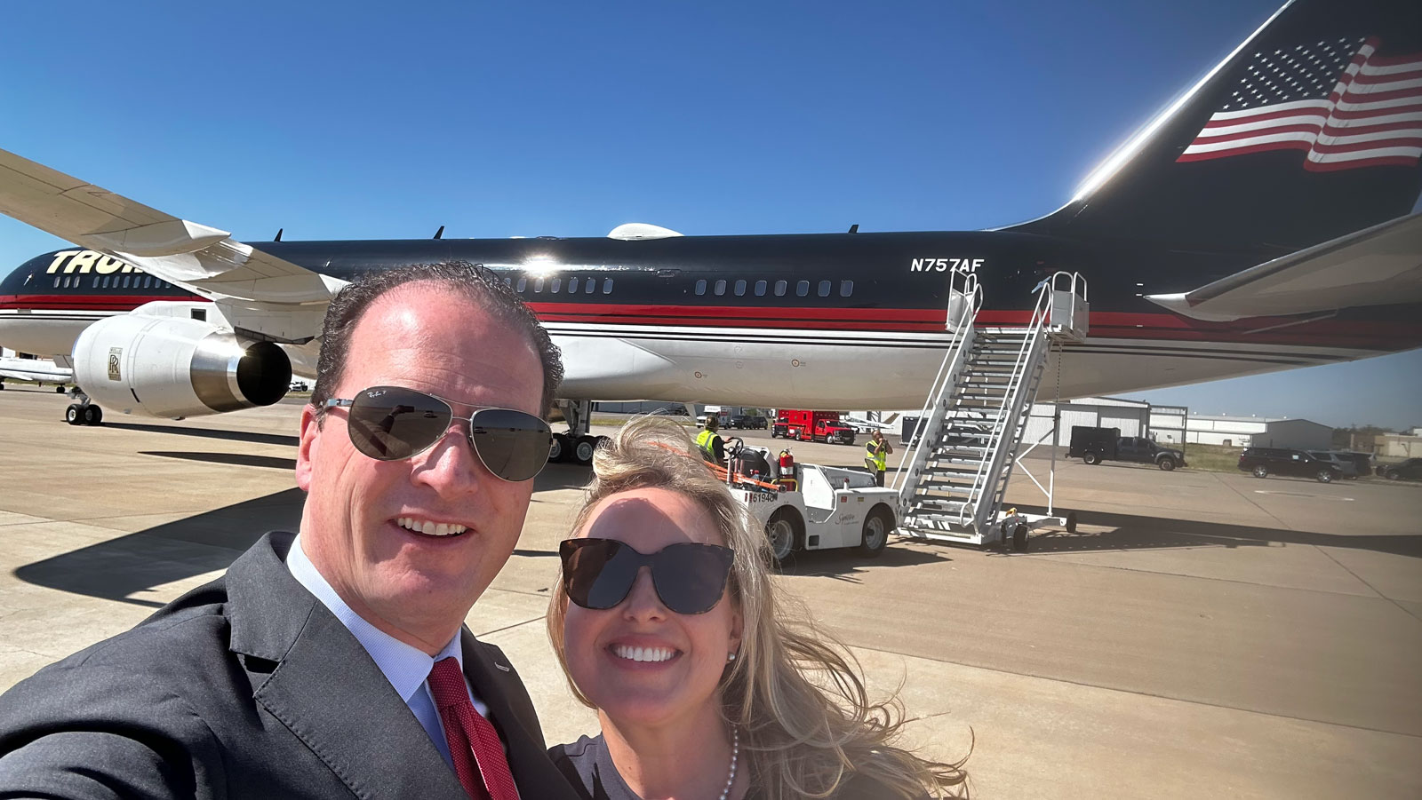 Rep. August Pfluger and wife Camille taking the obligatory selfie in front of Trump Force 1 on Oct 2, 2024 Rep. August Pfluger and wife Camille taking the obligatory selfie in front of Trump Force 1 on Oct 2, 2024