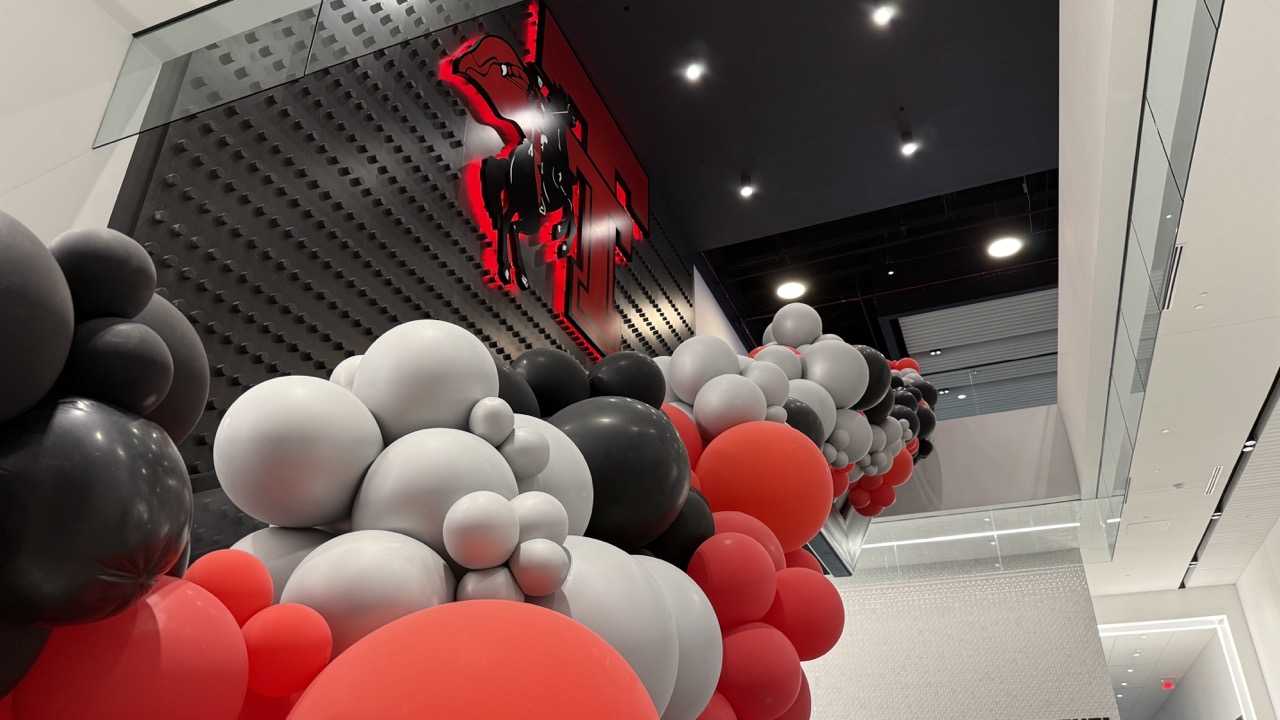 The Masked Rider Logo Leading Up to the Second Story of the Womble Center