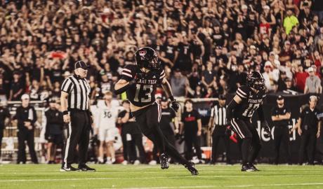 Texas Tech Red Raiders' Ben Roberts (13) and Jacob Rodriguez (10) in action against Cincinnati