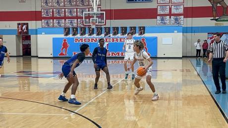 Monterey Plainsman E. Garcia dribbles around a defender in Friday's game against Palo Duro.