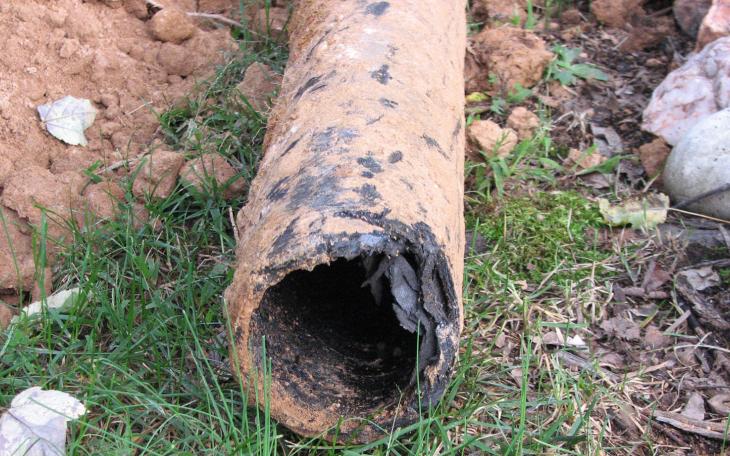Orangeburg pipe, originating in the late 19th century, is made of layers of ground wood pulp and asbestos fibers compressed and bound by a water-resistant adhesive, then impregnated with liquefied coal tar pitch.