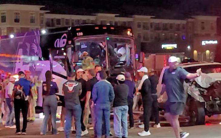 Lubbock Fire and Rescue helps the injured off the Abilene Christian University bus carrying its football team.