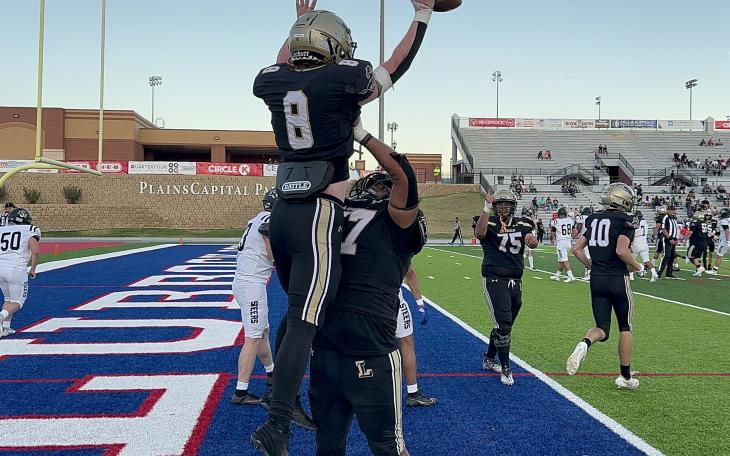 Lubbock High's Braiden Dunkerson and Joseph Acuna after a touchdown against Big Spring