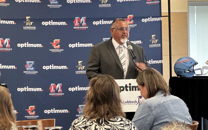 Lubbock High's Head Coach Juan Rodriguez speaks at the Lubbock ISD Football Coaches Media Luncheon on Thursday, Sept. 5