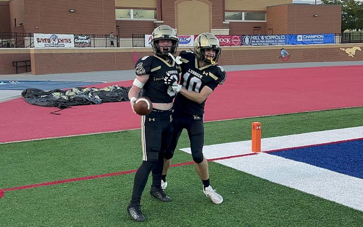 Lubbock High Westerners Braiden Dunkerson and Isaac Lagasse in action against Big Spring