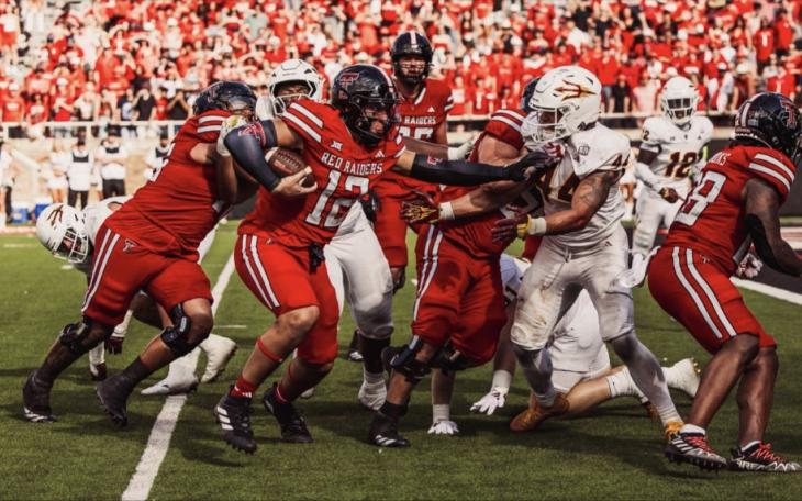 Texas Tech's Jalin Conyers scores a touchdown against Arizona State