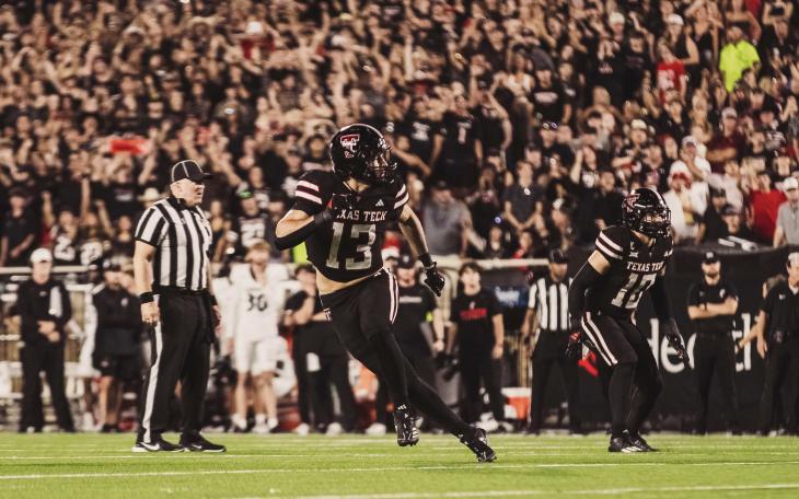 Texas Tech Red Raiders' Ben Roberts (13) and Jacob Rodriguez (10) in action against Cincinnati