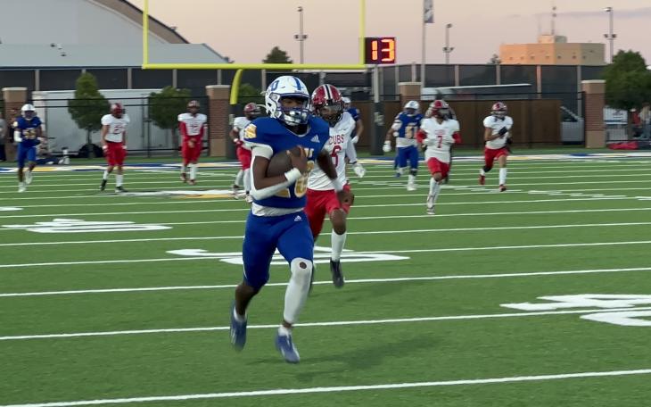Lubbock Christian's DaiDai Atkins breaks away from Brownfield's defense.