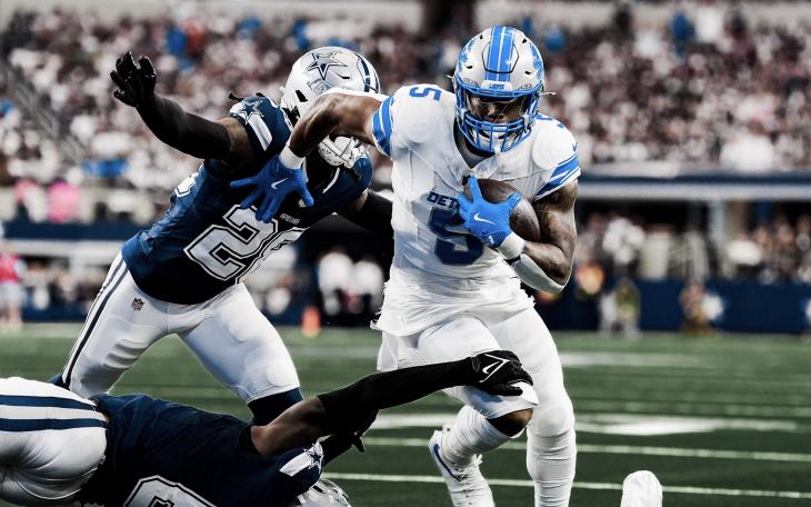 Detroit Lions David Montgomery barrels through the Dallas Cowboys Defense