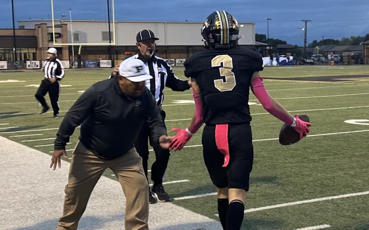 Post Coaching Staff Congratulates Antelopes' Maxx Cole after a big play against Olton