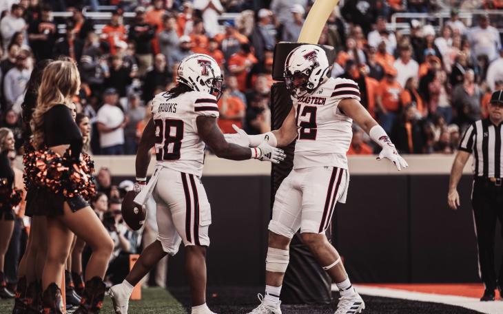 Texas Tech's Tahj Brooks and Jaylen Conyers Celebrate a touchdown in the win over Oklahoma State