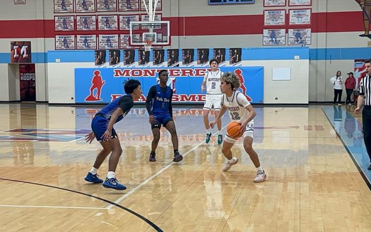 Monterey Plainsman E. Garcia dribbles around a defender in Friday's game against Palo Duro.