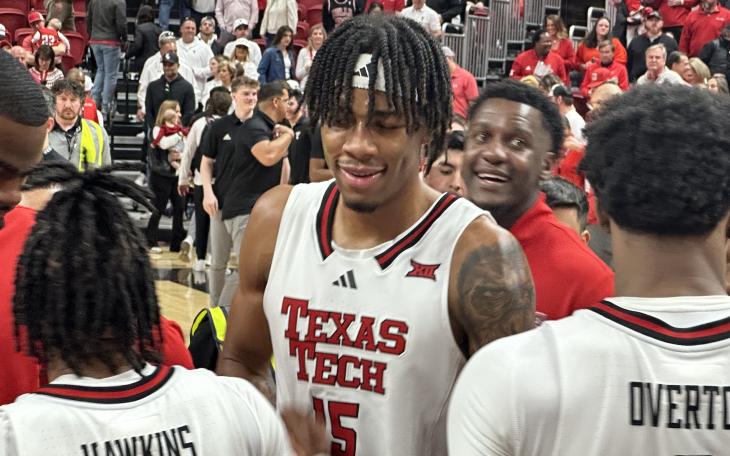 Texas Tech Red Raiders JT Toppin (Center), Elijah Hawkins (Left), and Kevin Overton (Right)