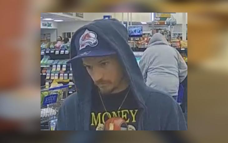 The suspect is described as a white male wearing a black t-shirt with the word &quot;Money&quot; on the front, a blue zip-up hoodie, blue jeans, and a blue Colorado Avalanche hat.